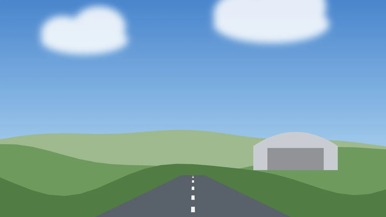 Start- und Landebahn mit Hangar am Flugplatz