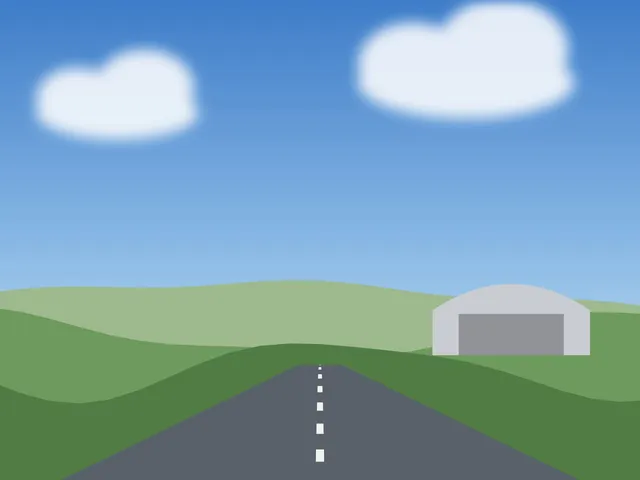 Start- und Landebahn mit Hangar am Flugplatz